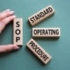 letter blocks spelling warehouse sops standard operating procedures